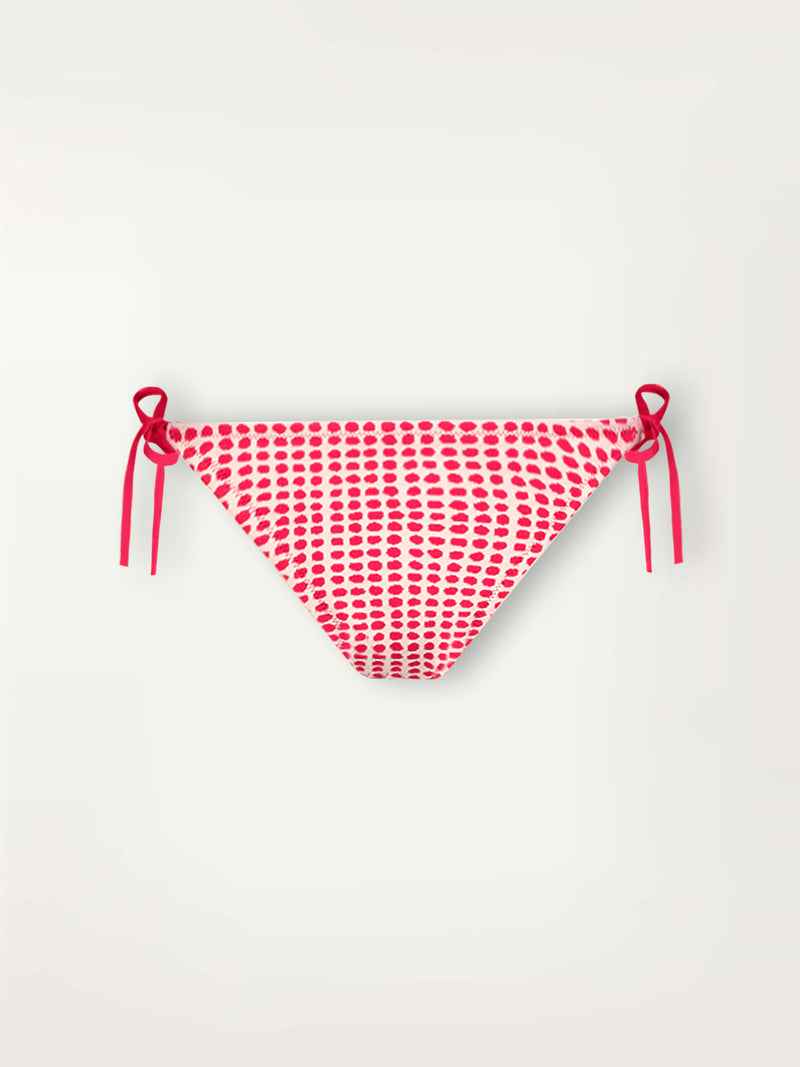 Product Back Shot of Rekka String Bottom featuring vibrant raspberry dots on an ivory background