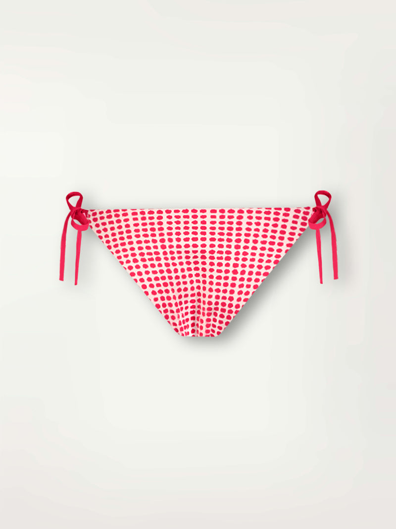 Product Front Shot of Rekka String Bottom featuring vibrant raspberry dots on an ivory background