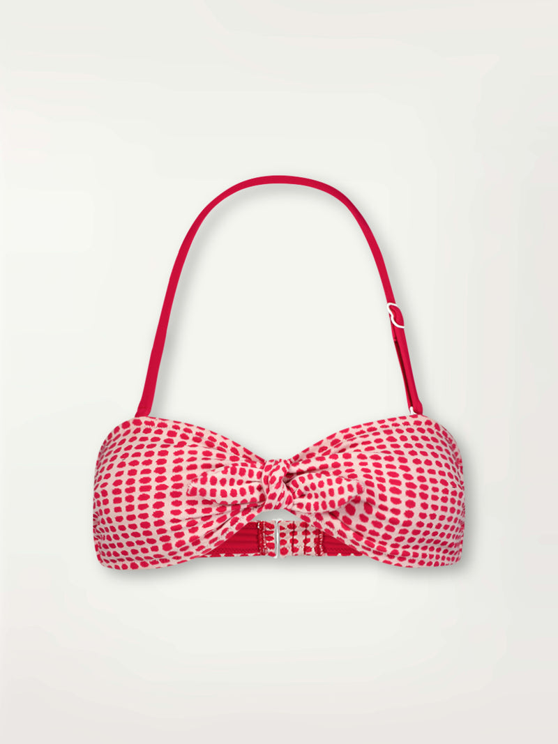 Product Front Shot of Ava Bandeau Top featuring vibrant raspberry dots on an ivory background