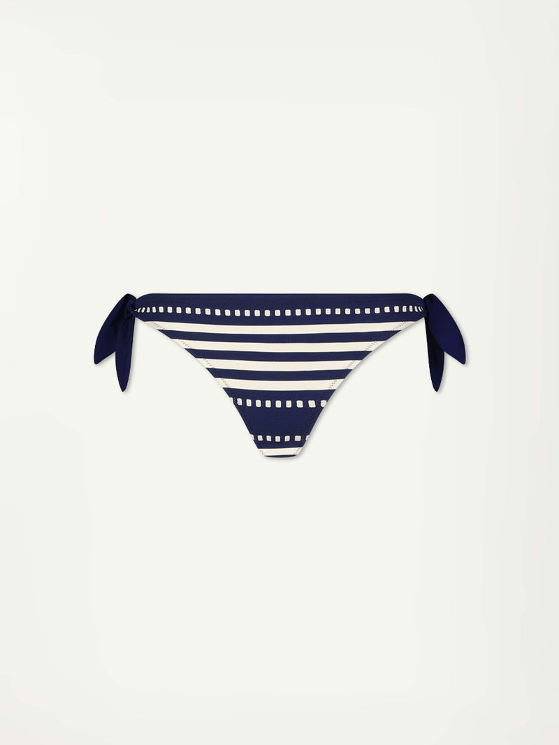 Product Front Shot of  lemlem LUCY Side Tie Bottom featuring a classic navy background with ivory stripes and dots