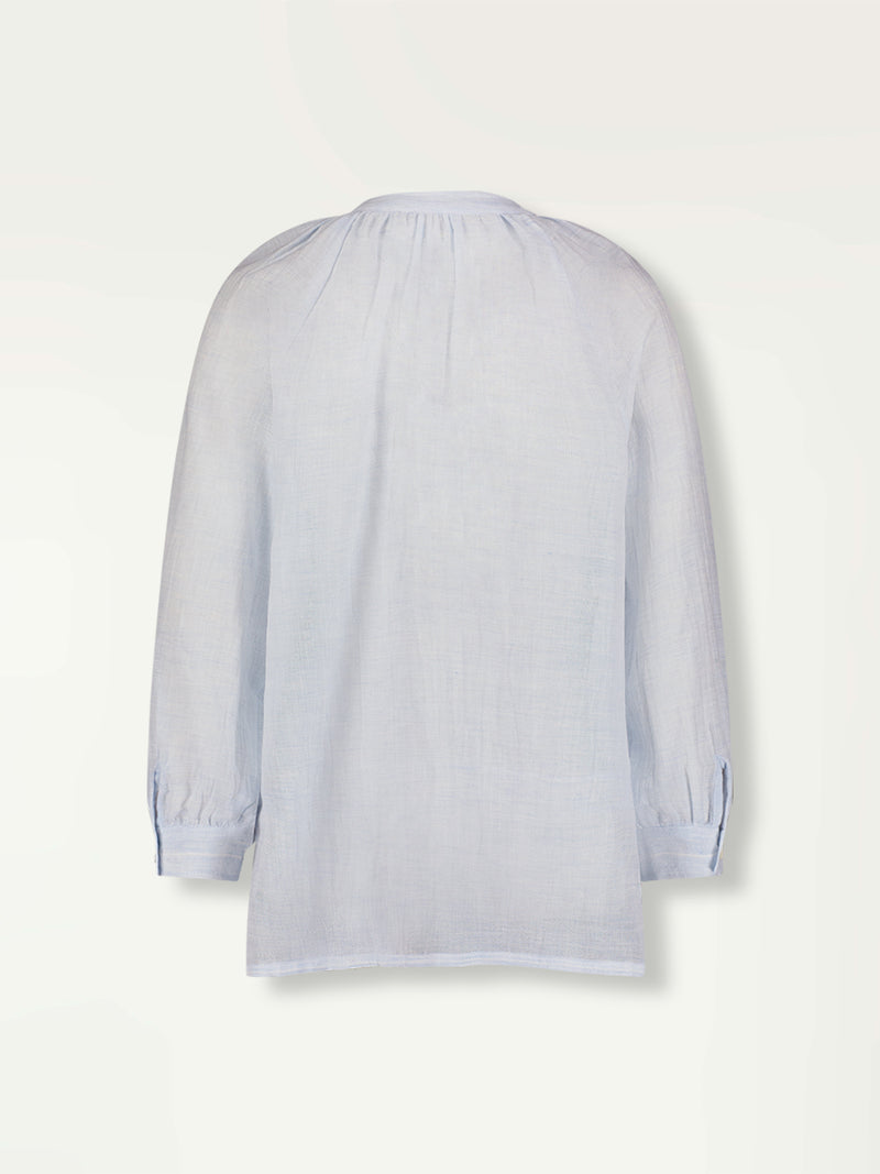 Product Back Shot of lemlem Mita Button Up Blouse featuring airy gauze fabric in a delicate pale blue color.