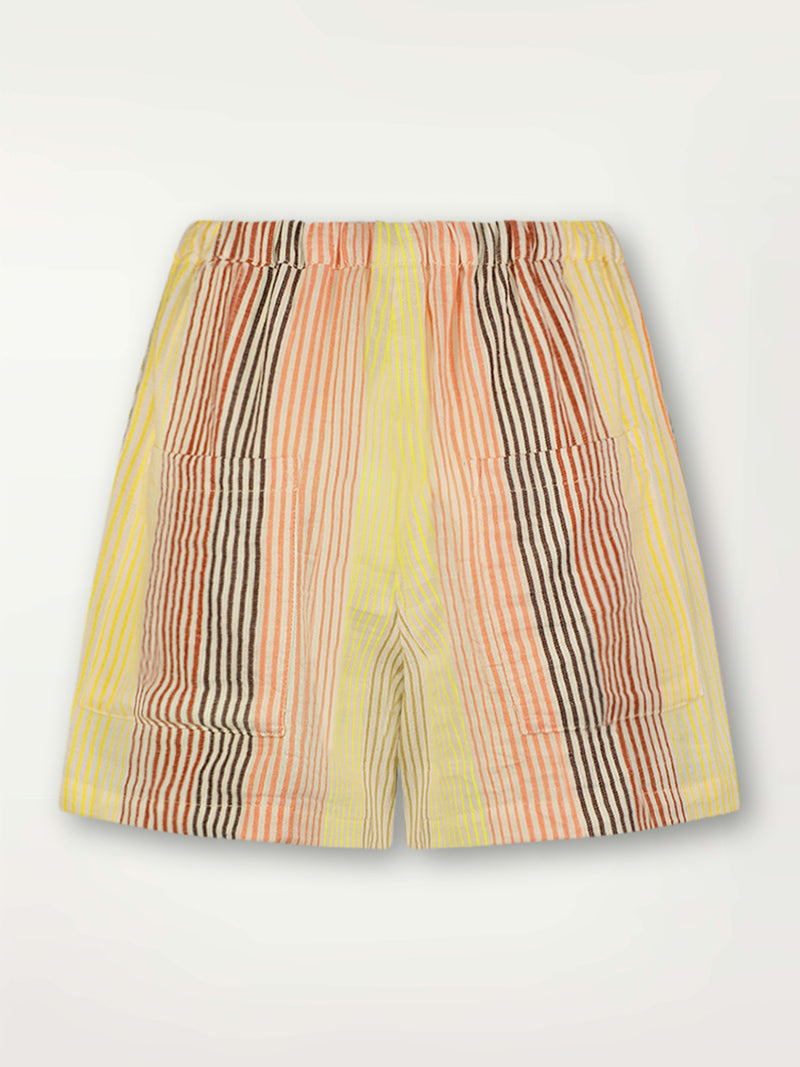 Product Back Shot of lemlem Safia Shorts featuring continuous stripe pattern in warm yellow, orange and peach tones.