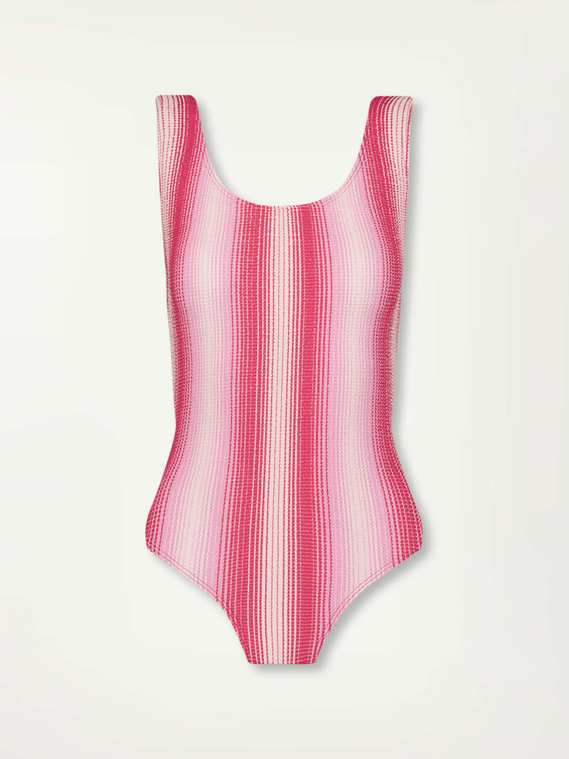 Product Front Shot of lemlem Haset One Piece featuring striped fabric in ombre design in white, soft pink, and raspberry colors