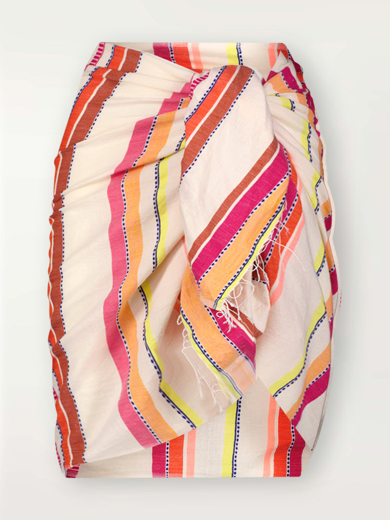 Product Front shot of lemlem Lema Sarong featuring tibeb inspired stripes in a vibrant fiesta of colors against a creamy vanilla background.