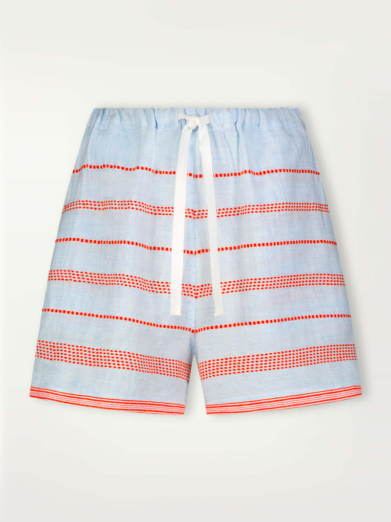 Product Front Shot of lemlem Safia Shorts featuring playful pattern of red dots becoming stripes on a pale blue background