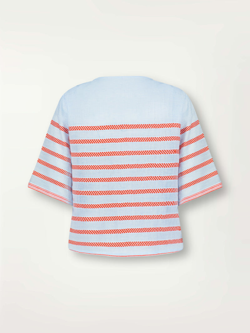 Product Back Shot of lemlem Rita V Neck Top featuring playful pattern of red dots becoming stripes on a pale blue background