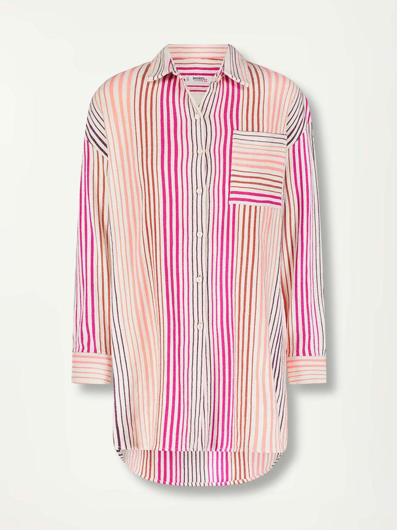 Product Front Shot of lemlem Mariam Shirt featuring ombre stripe pattern, where deep plum seamlessly transitions into peach, chestnut, and bright pink.