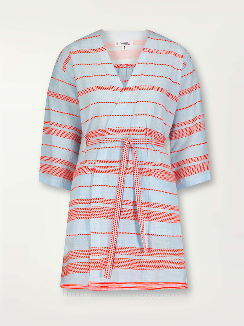 Product Front Shot of lemlem Imani Robe featuring playful pattern of red dots becoming stripes on a pale blue background