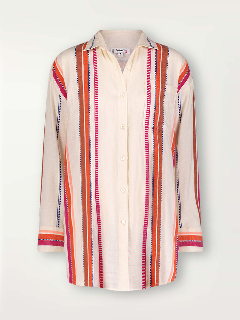 Product Front shot of lemlem Mariam Shirt featuring tibeb inspired stripes in a vibrant fiesta of colors against a creamy vanilla background.