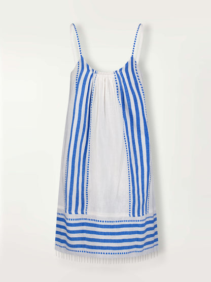 Product Front Shot of lemlem Zina Swing Dress Featuring crisp white background and bright blue stripes and dots pattern