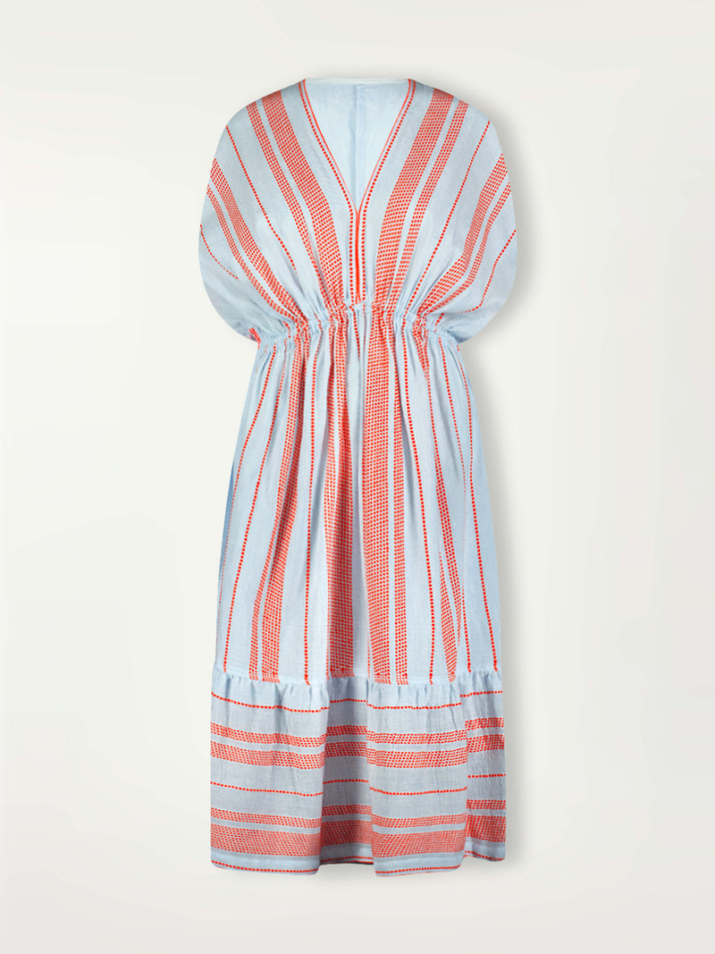 Product Front Shot of lemlem Plunge Dress featuring playful pattern of red dots becoming stripes on a pale blue background