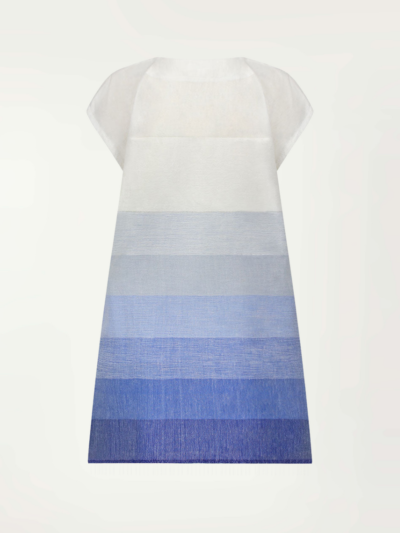 Product-shot of the back of the Zaza Tunic featuring white to blue degrade stripes. 