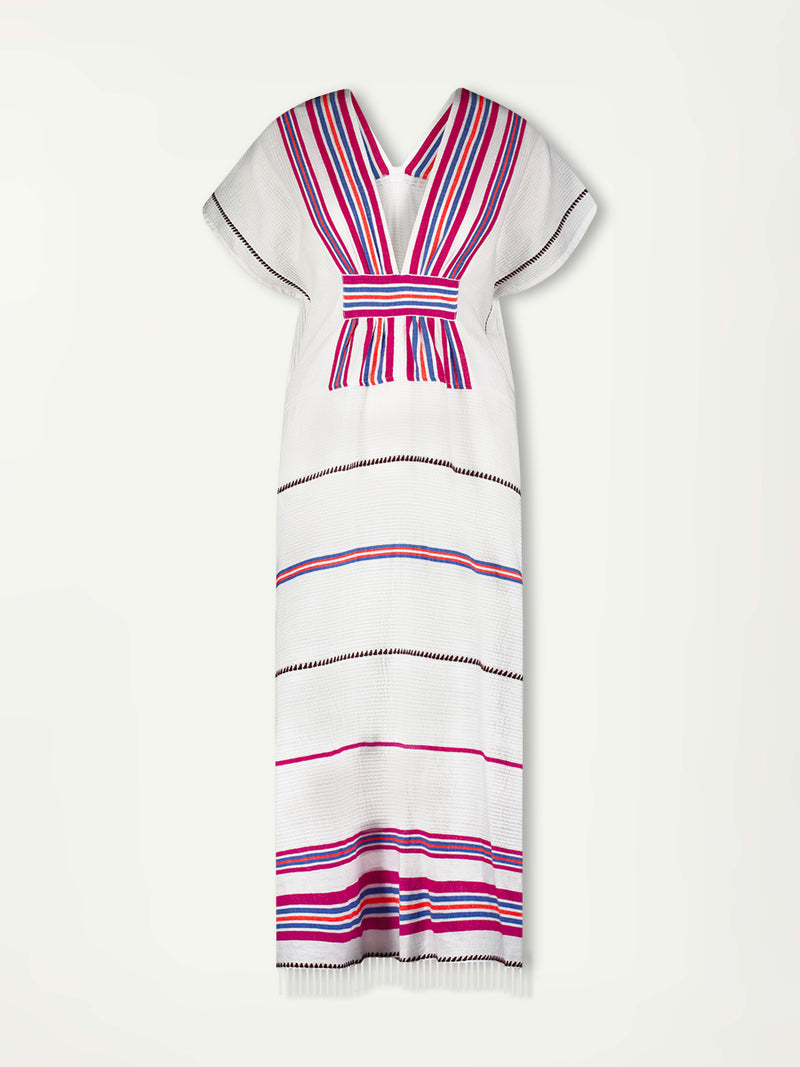 Product Front shot of lemlem Gasira Caftan featuring stripe pattern of bright magenta, blue, and orange on s crispy white background.