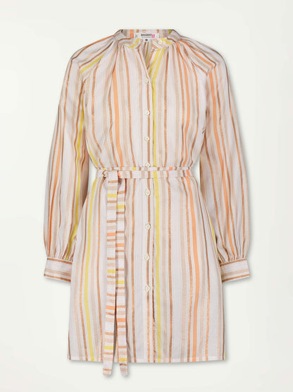 Product Front Shot of lemlem Meaza Button Up Dress Featuring sunny shades of orange, pink, gold and bronze glisten in a striking stripe pattern.