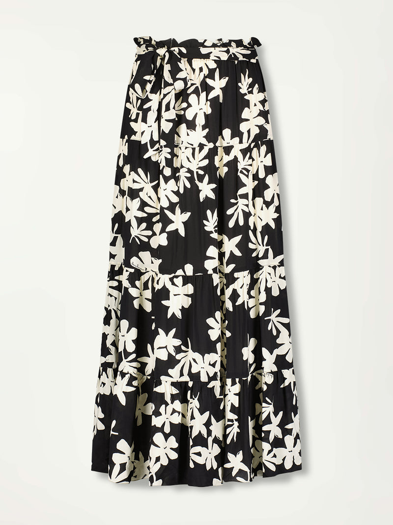 product fron shot of lemlem sanaa skirt  featuring a cream graphic floral pattern. 