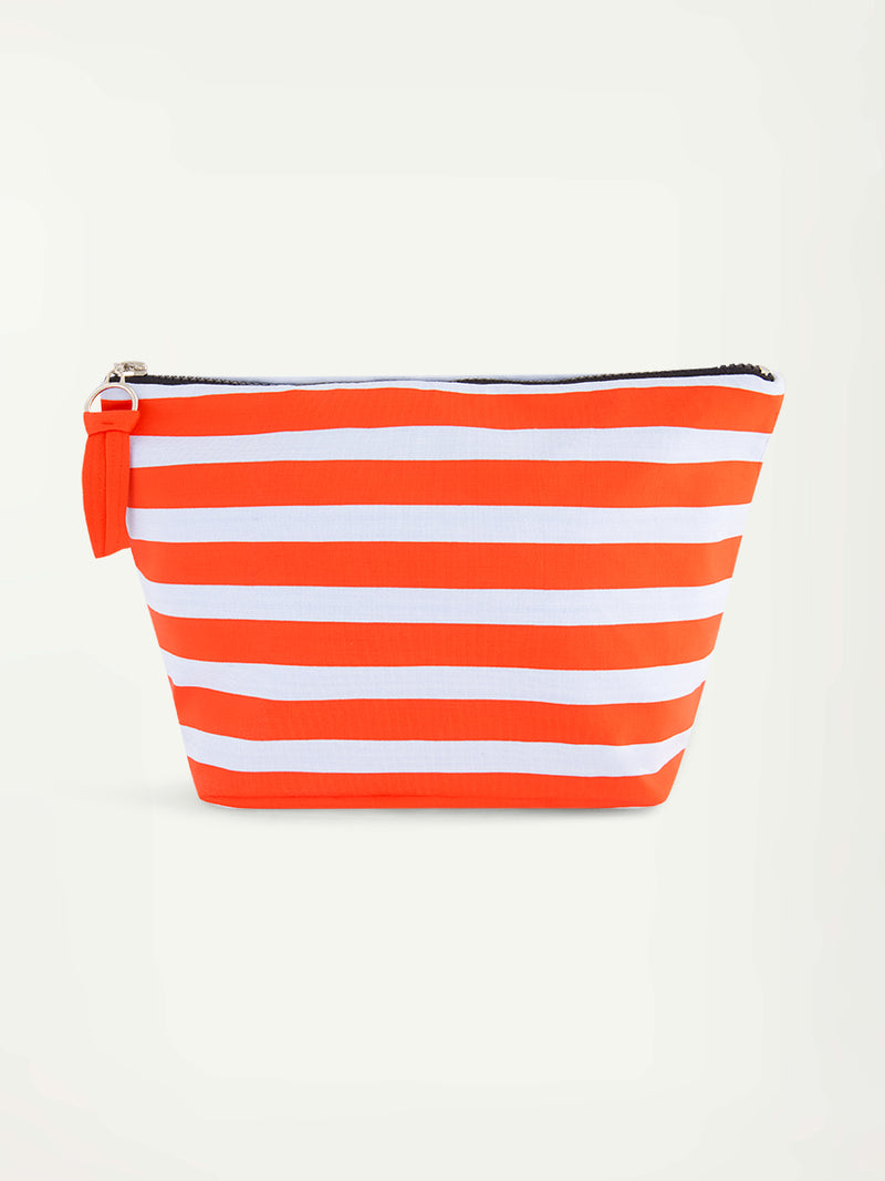 Product Front Shot of lemlem Cora Pouch featuring bold and bright tangerine color, accented by pale blue stripes