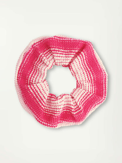 Product Front Shot of lemlem Lishan Scrunchie  featuring striped fabric in ombre design in white, soft pink, and raspberry colors