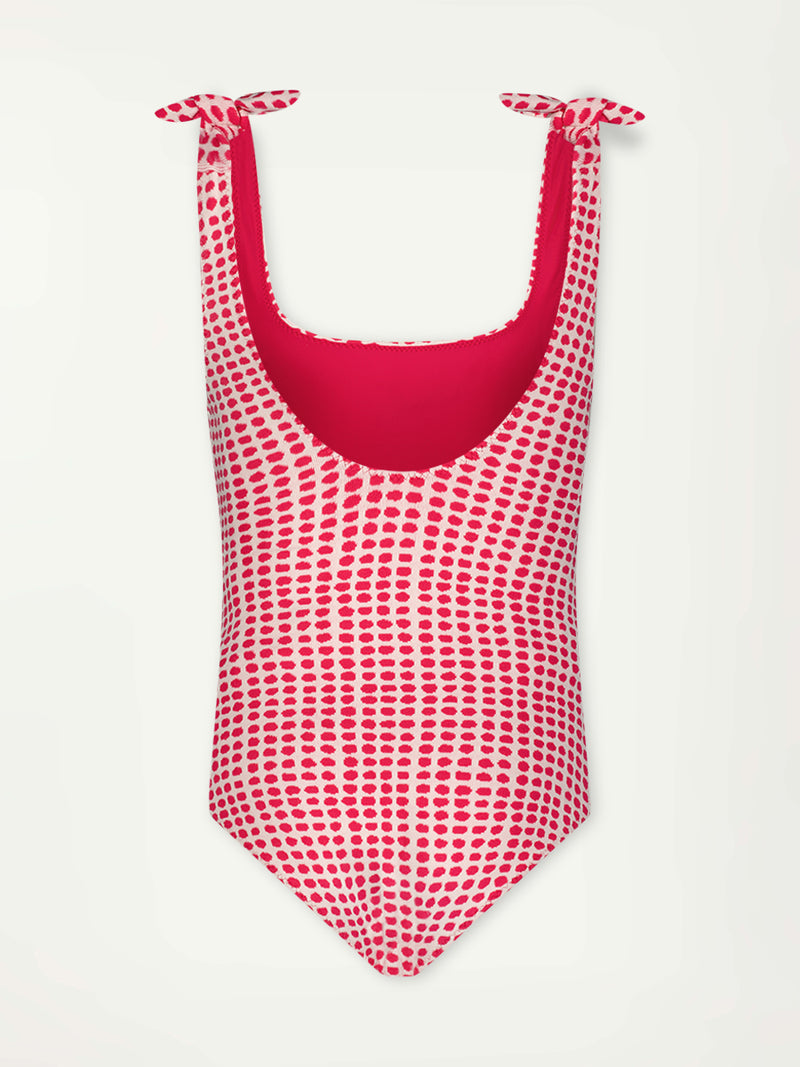 Product Back Shot of lemlem Sosina One Piece swimsuit featuring vibrant raspberry dots on an ivory background