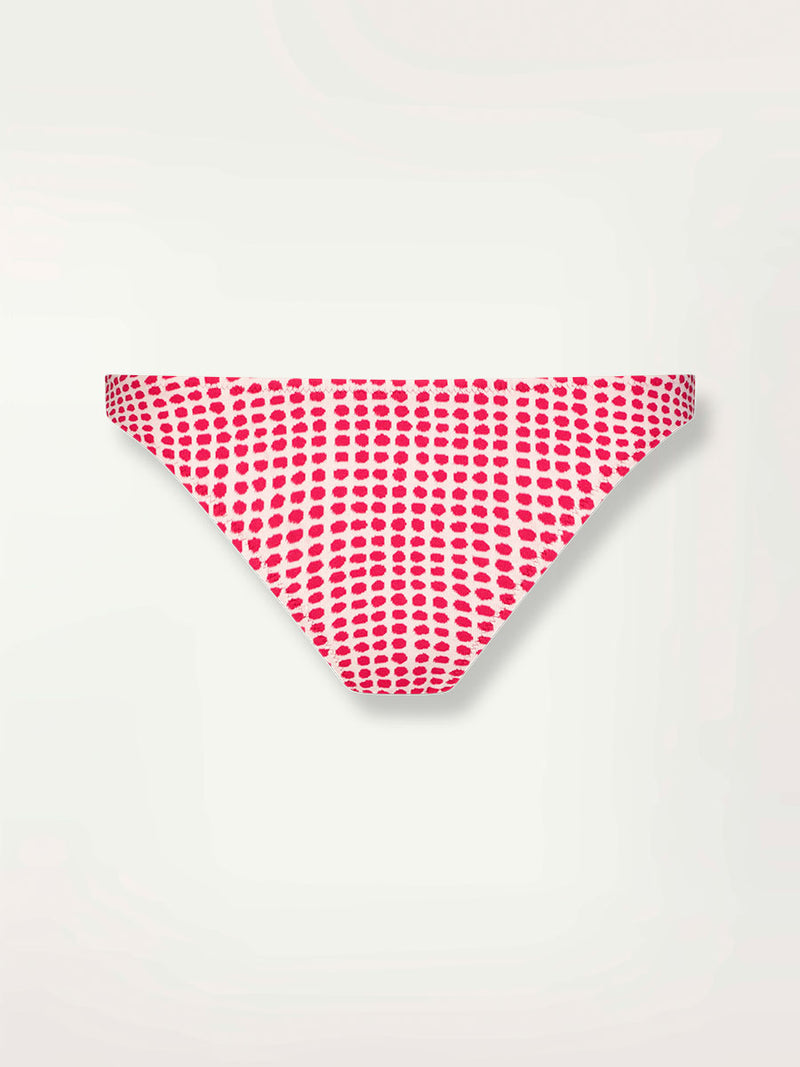 Product Front Shot of lemlem Meron Brief Bottom featuring vibrant raspberry dots on an ivory background