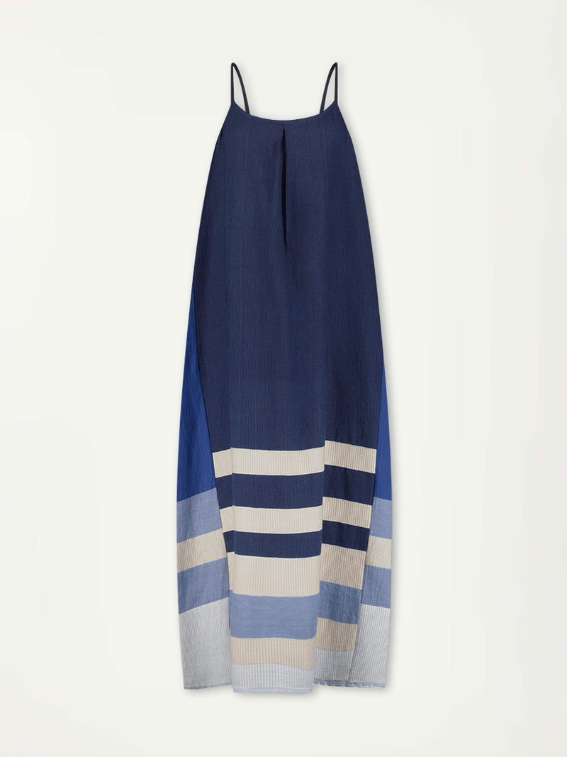 Product Front Shot of  lemlem NIA Slip Dress featuring a striking color-block combination of three shades of blue, paired with bands of neutral cream and white