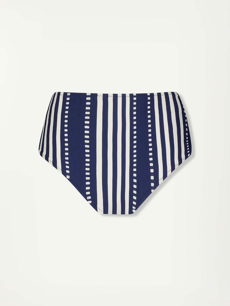 Product Front Shot of lemlem ELSI High Waist Bottom featuring a classic navy background with ivory stripes and dots and matching bandeau top