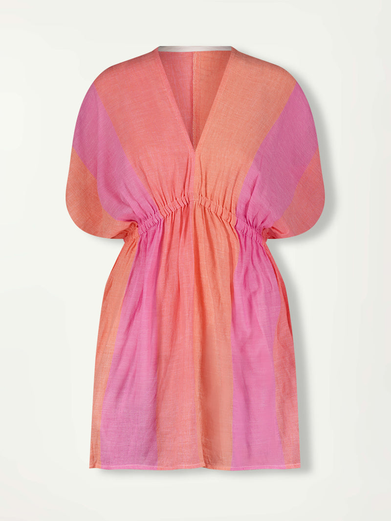 Product Front Shot of  lemlem ALEM Plunge Dress featuring light, gauzy fabric with a beautiful ombre color block of pink, blush, and peach colors.